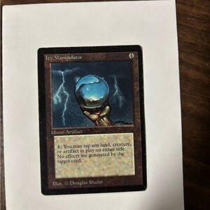 Icy Manipulator Trading Card with Striking Blue and Brown Design beta card